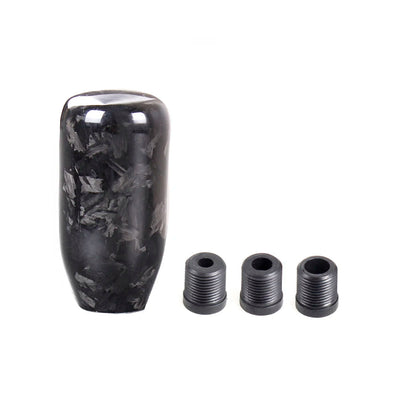 Pommeau de vitesse tuning cylindrique noir en fibre forgée pour levier de vitesse manuel.