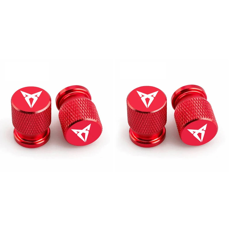 Bouchons de valve Cupra, de couleur rouge avec logo Cupra inscrit sur les bouchons de valve.