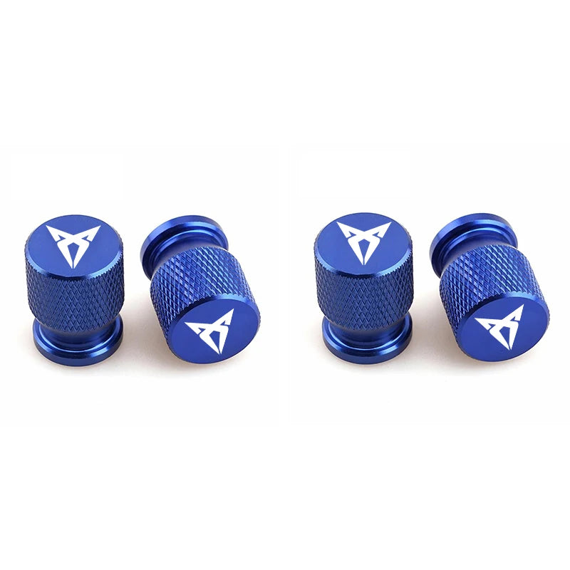 Bouchons de valve Cupra, de couleur bleu avec logo Cupra inscrit sur les bouchons de valve.