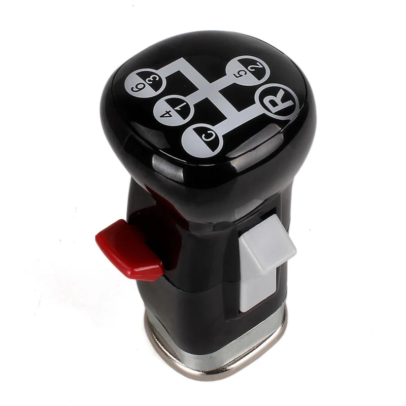 Pommeau de vitesse camion Volvo FH de couleur noir et le marquage des vitesses en blanc.