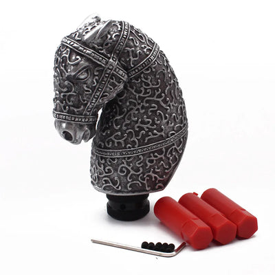 Pommeau de vitesse original en forme de tête de cheval, de couleur gris.