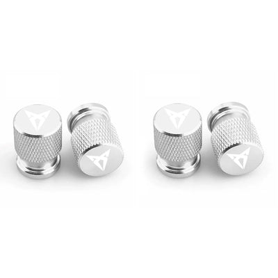 Bouchons de valve Cupra, de couleur argent avec logo Cupra inscrit sur les bouchons de valve.