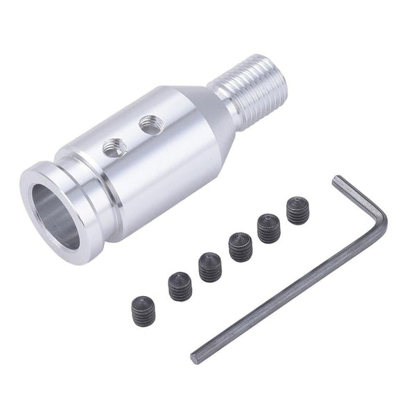 Adaptateur pour pommeau de vitesse de couleur gris.