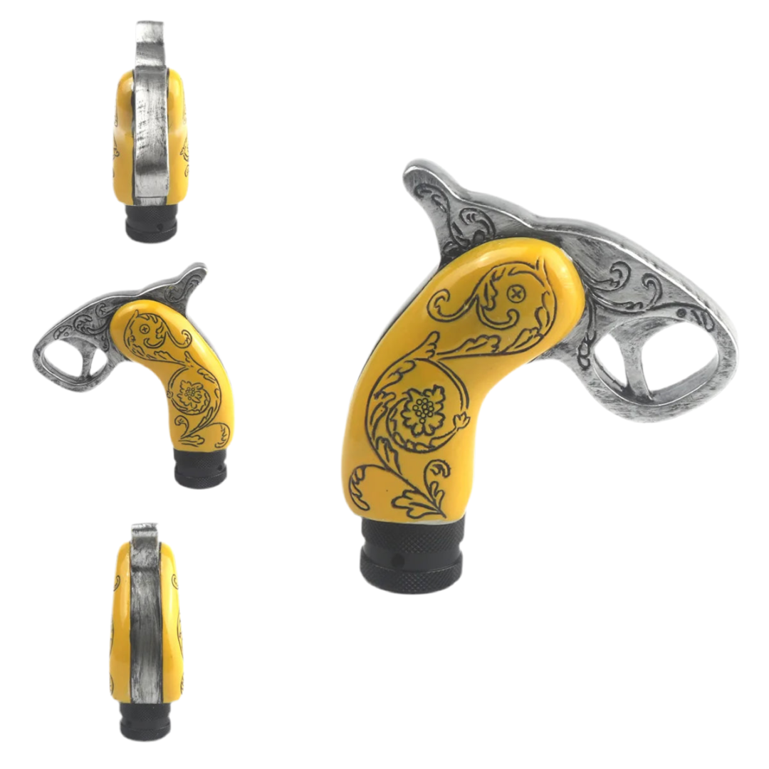 Pommeau de vitesse manche de pistolet avec un look contemporain et des motifs à fleur sur le manche de couleur jaune et gris.