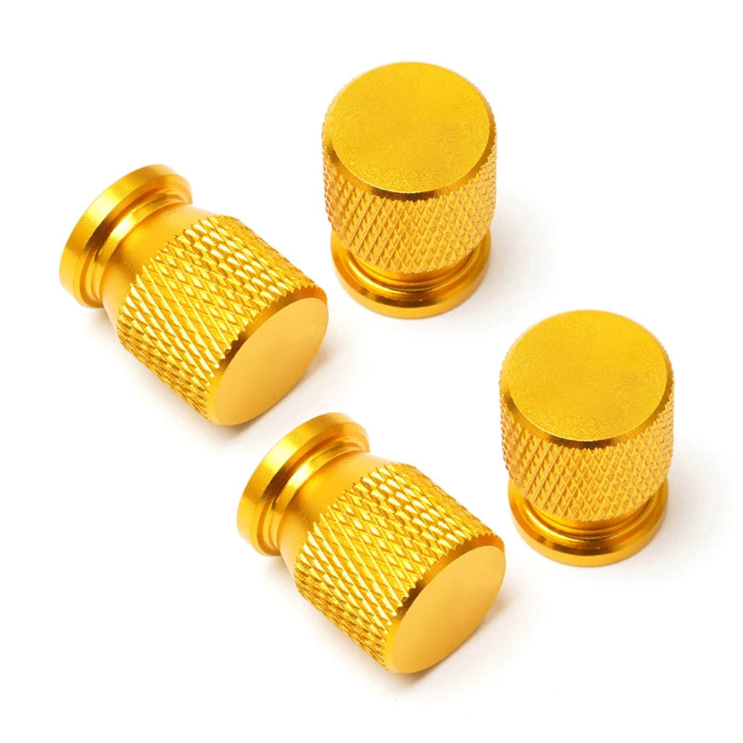 Bouchon de valve jaune pour pneu de voiture.