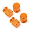 Bouchon de valve uni de couleur orange pour pneu voiture.