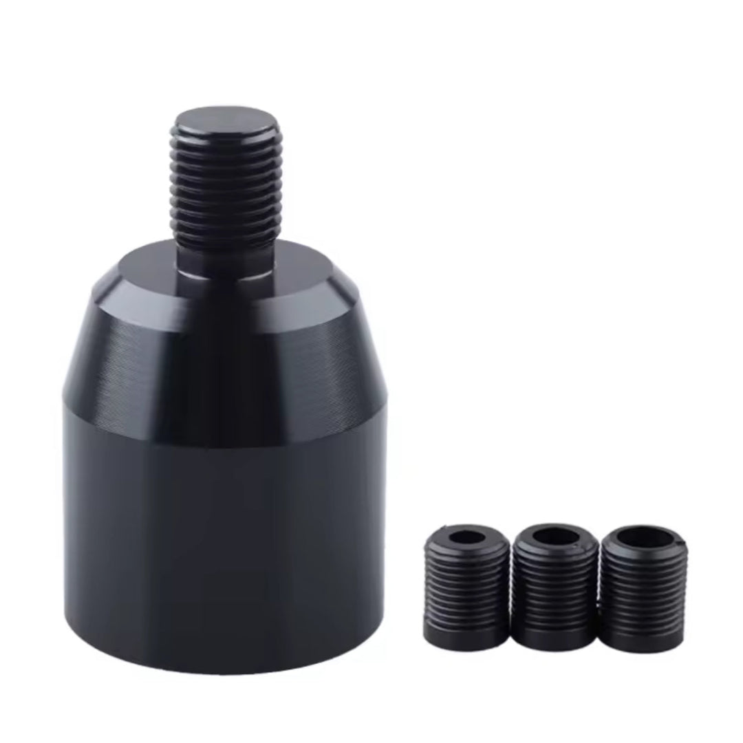 Adaptateur pour pommeau de vitesse avec bague de marche arrière de couleur noire.