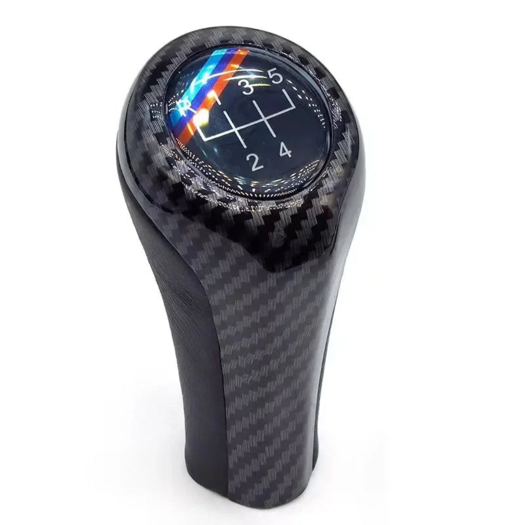Pommeau de vitesse BMW E90 couleur carbone pour boîte 5 vitesses.