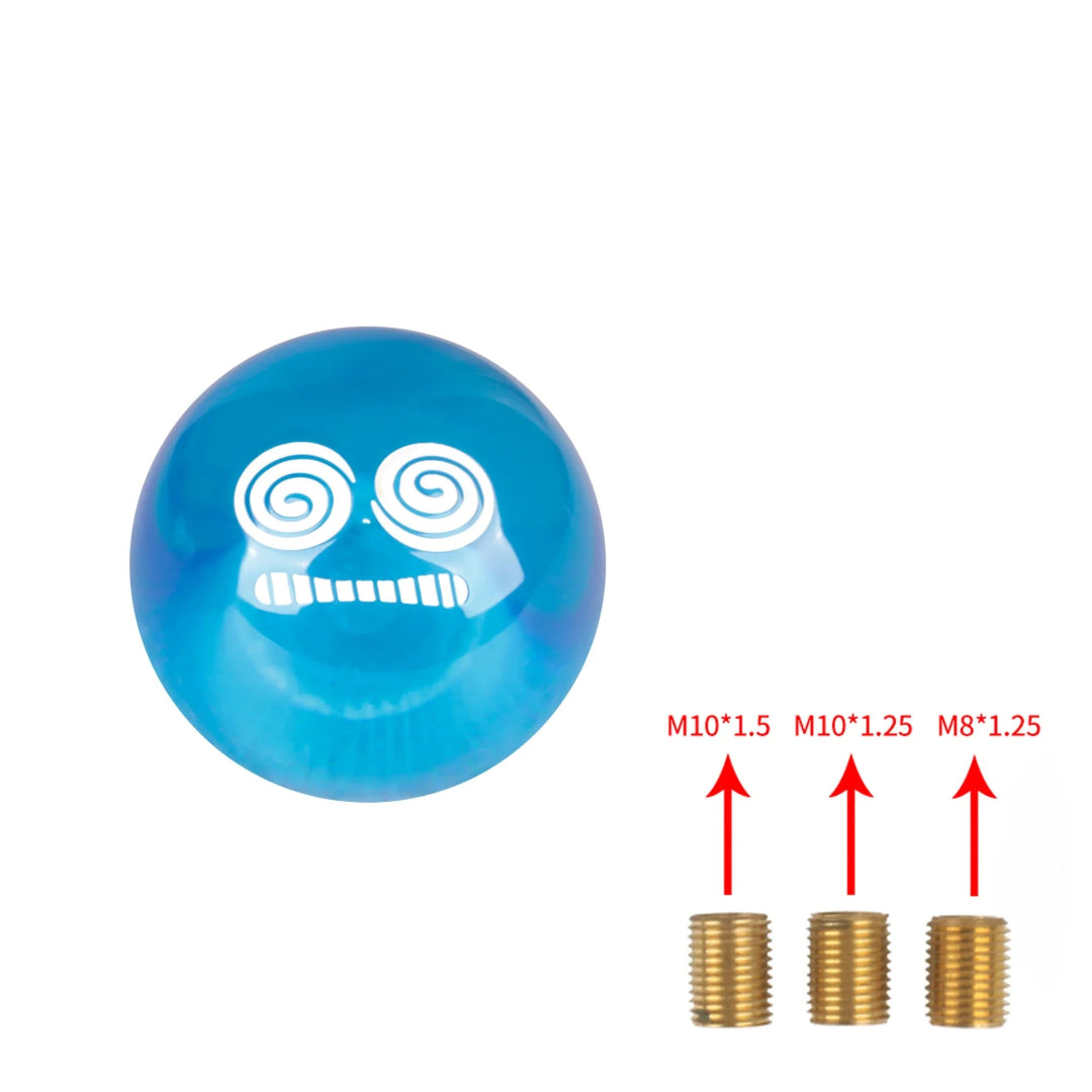 Pommeau de vitesse original, de couleur bleu, avec un visage sur le pommeau.