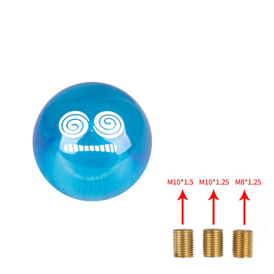 Pommeau de vitesse original, de couleur bleu, avec un visage sur le pommeau.
