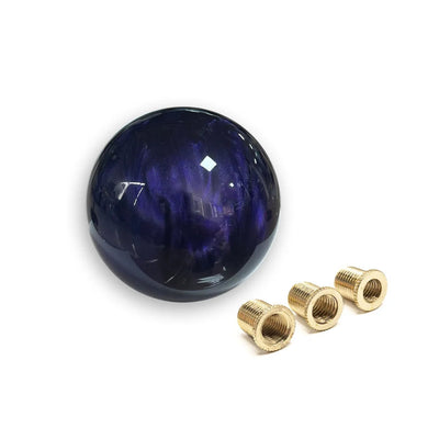 Pommeau de vitesse marbré violet foncé forme ronde et finition élégante