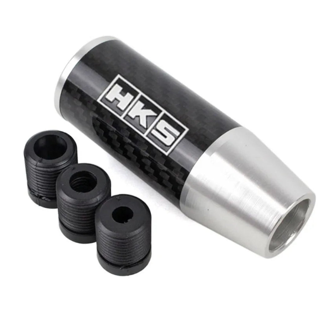 Pommeau tuning HKS couleur noir et gris avec adaptateurs.