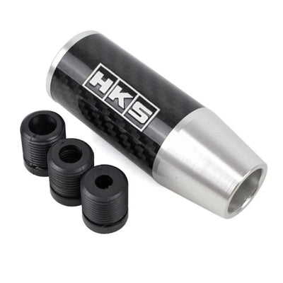 Pommeau tuning HKS couleur noir et gris avec adaptateurs.
