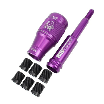 Pommeau de vitesse tuning V5 réglable en hauteur couleur violet.
Pommeau de vitesse