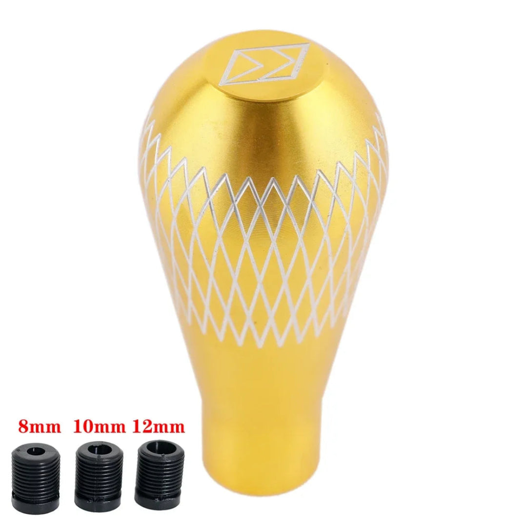 Pommeau de vitesse tuning V3 et ses 3 adaptateurs de couleur jaune.
