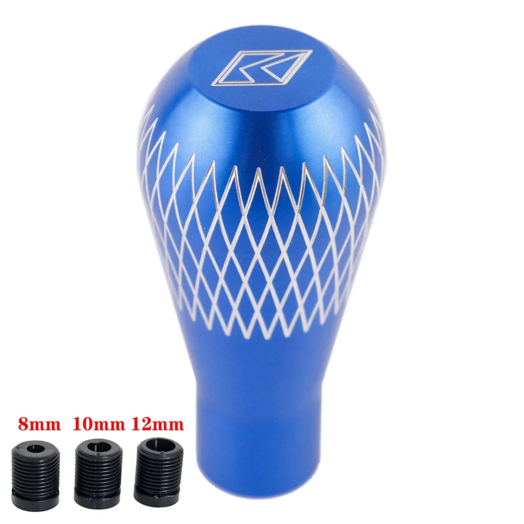 Pommeau de vitesse tuning V3 et ses 3 adaptateurs de couleur bleu.