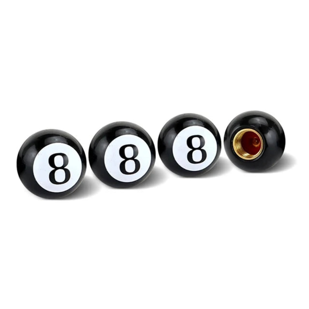 Bouchon de valve noir, qui ressemble à la boule noir de billard.