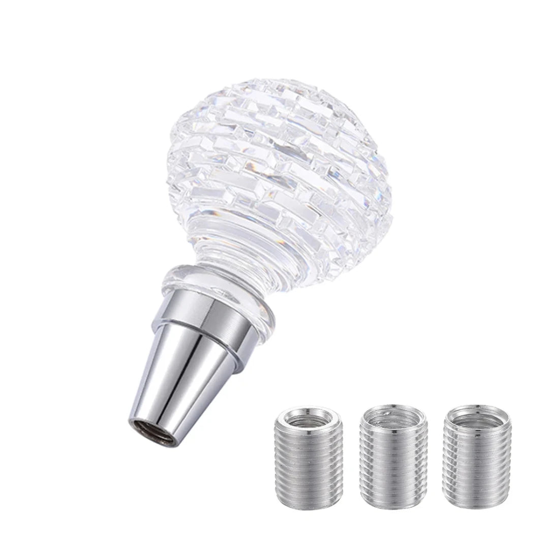 Pommeau de vitesse crystal en forme de boule, avec marque sur la partie sphérique.