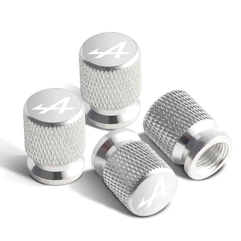 Bouchons de valves Renault Alpine de couleur argent, avec le logo Alpine sur le bouchon.