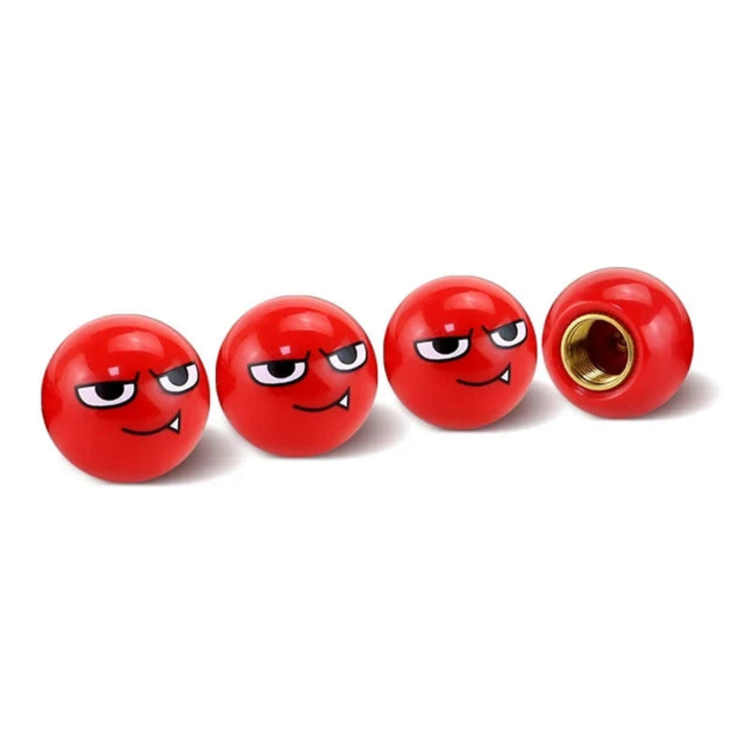 bouchon de valve rouge avec le regard d'un petit personnage.