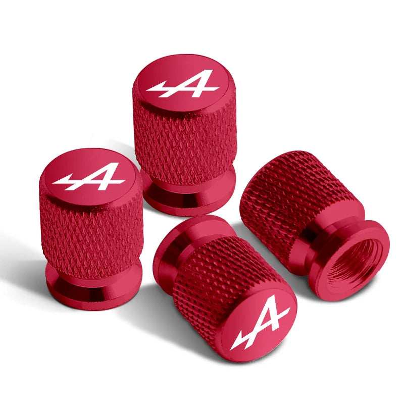 Bouchons de valves Renault Alpine de couleur rouge, avec le logo Alpine sur le bouchon.