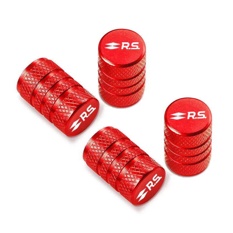 Bouchon de valve pneu voiture, de couleur rouge avec logo RS inscrit dessus.