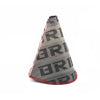 Soufflet levier de vitesse universel de couleur beige et gris avec motif BRIDE sur le soufflet.