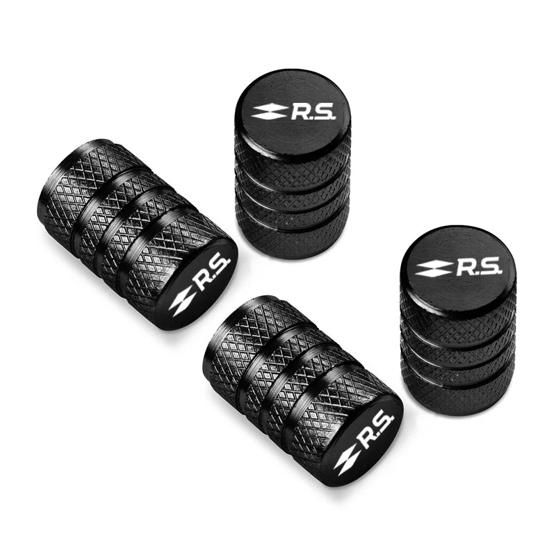 Bouchon de valve pneu voiture, de couleur noir avec logo RS inscrit dessus.
