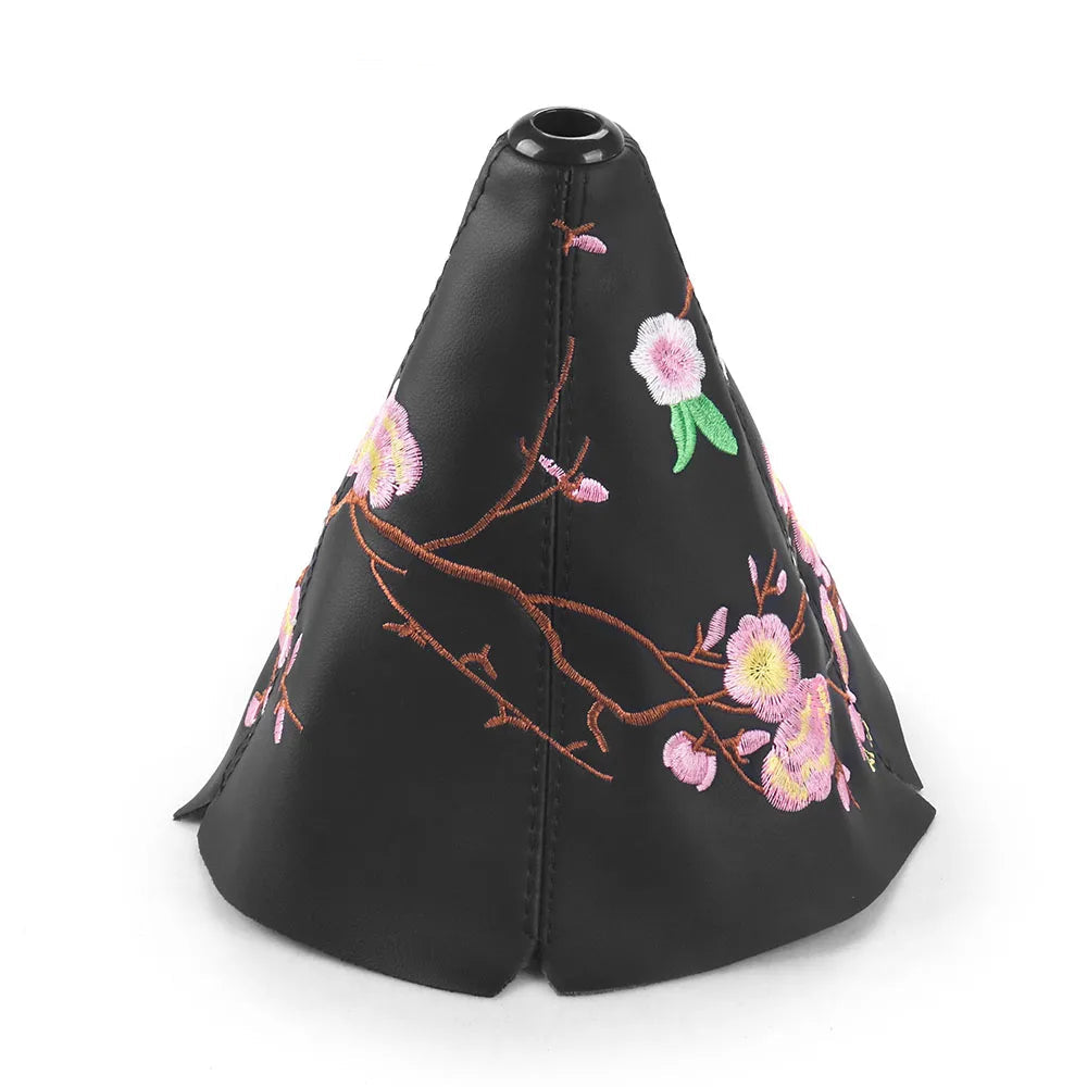 Soufflet levier de vitesse universel avec motif à fleurs.