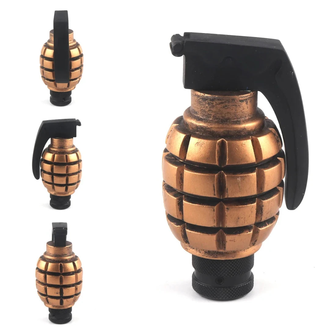 Pommeau de vitesse grenade de couleur cuivre.