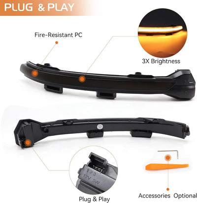 Clignotant de rétroviseur fumé vu de dessus avec connecteur à trois broches et outil plat orange