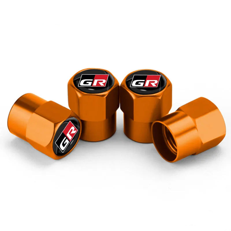 Bouchon de valve Toyota GR, de couleur orange avec logo GR sur le dessus du bouchon.