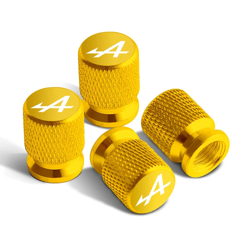 Bouchons de valves Renault Alpine de couleur jaune, avec le logo Alpine sur le bouchon.