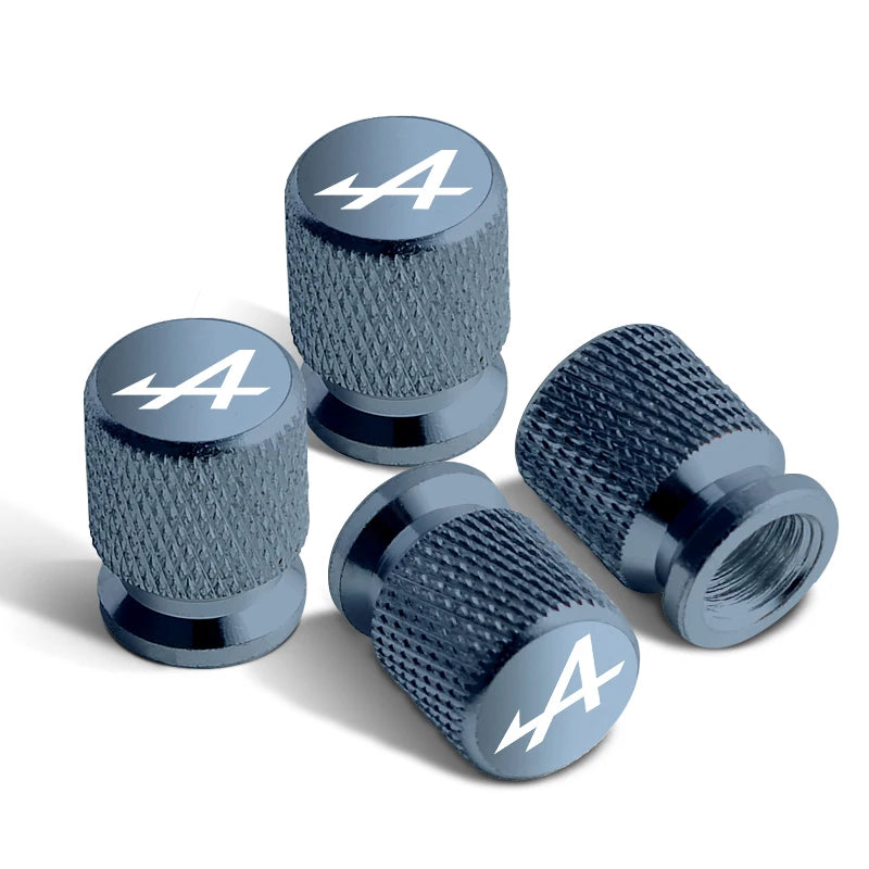 Bouchons de valves Renault Alpine de couleur gris, avec le logo Alpine sur le bouchon.