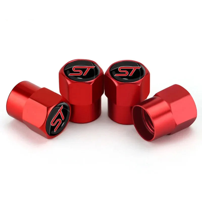 Bouchon de valve Ford ST, avec logo ST inscrit sur le dessus, de couleur rouge.