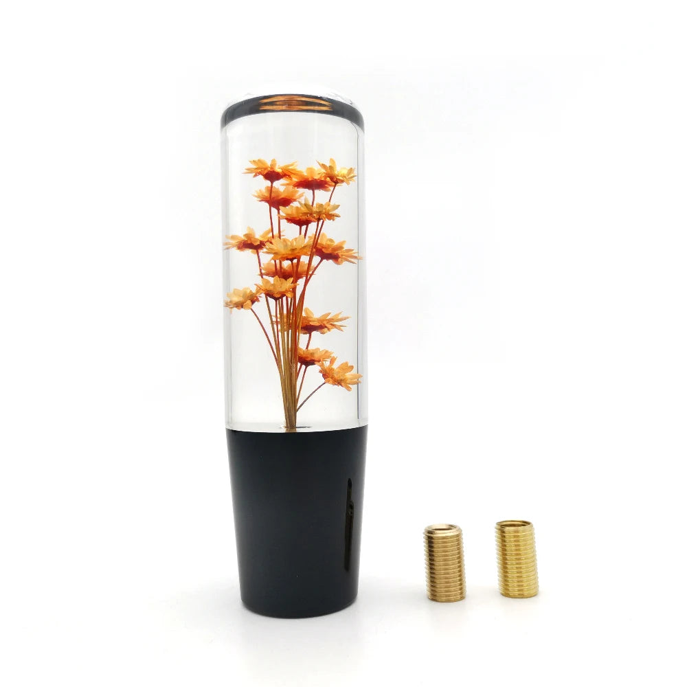 Pommeau de vitesse original fleuri orange 15 cm long pour boîte manuelle.