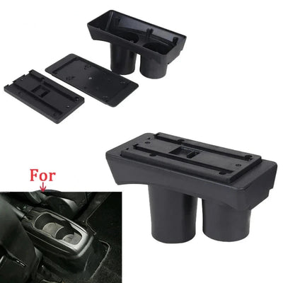 Socle de l'accoudoir Peugeot 301 avec ses deux porte-gobelets et ses plaques d'adaptation, et l'emplacement sur la console