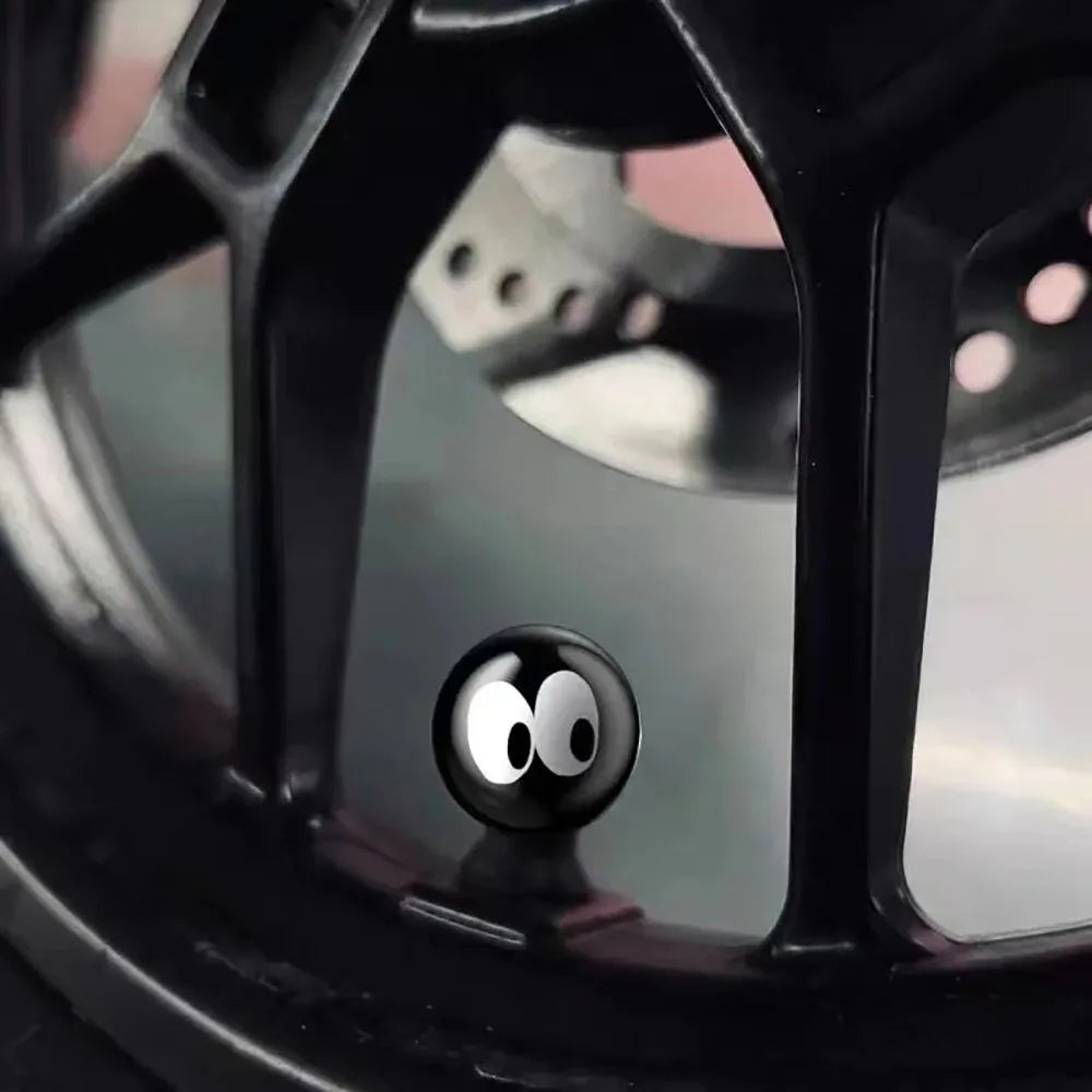 Bouchon de valve décoratif aux grands yeux blancs, monté sur la valve d'une jante