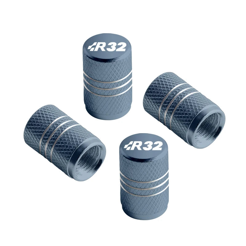 Bouchon de valve Golf R32 gris ardoise, logo R32 et filets gravés sur le corps moleté