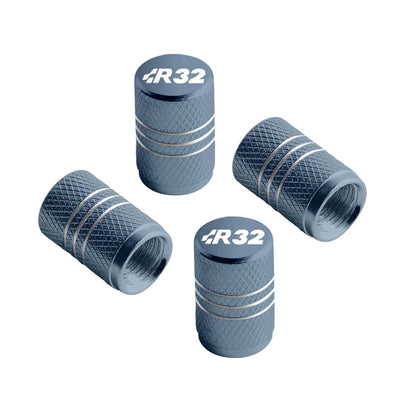 Bouchon de valve Golf R32 gris ardoise, logo R32 et filets gravés sur le corps moleté