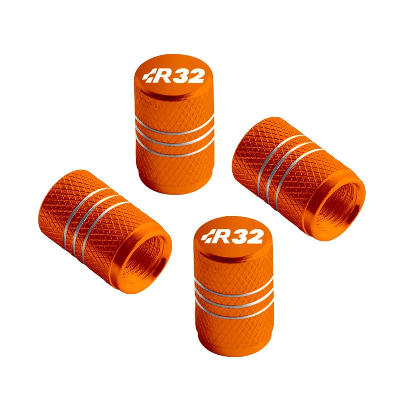 Bouchon de valve Golf R32 orange, aluminium anodisé à filets blancs