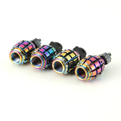 Bouchon de valve grenade multicolore vu de dessous, filetage et joint d'étanchéité visibles