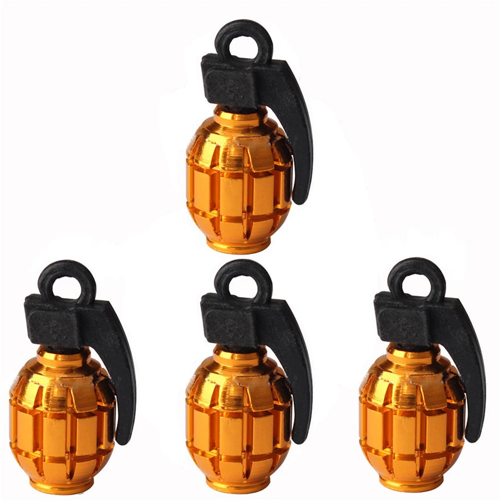 Bouchon de valve grenade or, quatre capuchons au corps quadrillé
