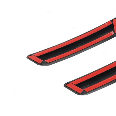 Bandes adhésives rouges au dos des lames du cache grille pare-chocs Land Rover