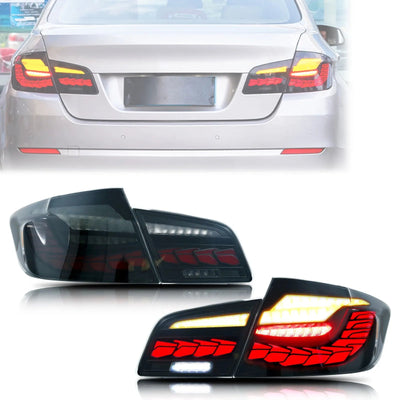 Jeu de feux arrière LED GTS fumés pour BMW F10, avec une F10 gris argent en fond