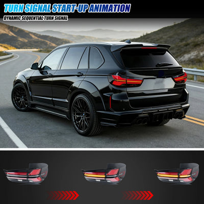 Clignotant séquentiel ambre des feux arrière LED sur un BMW X5 noir