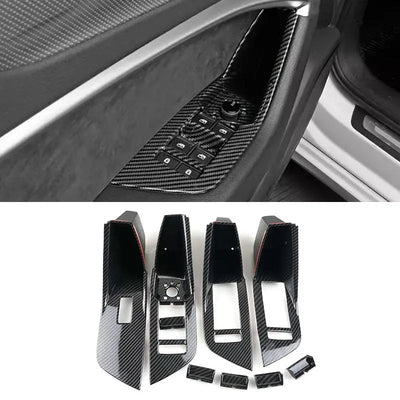 Garniture accoudoir porte carbone Audi A6 C8 posée sur la porte conducteur, avec le jeu de 10 pièces