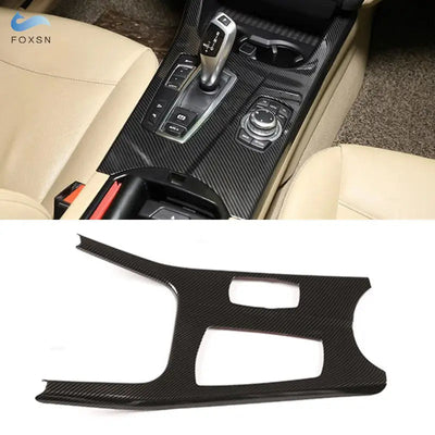 Garniture console centrale carbone montée sur BMW X3 F25 autour du sélecteur et de l'iDrive, avec la pièce seule en dessous