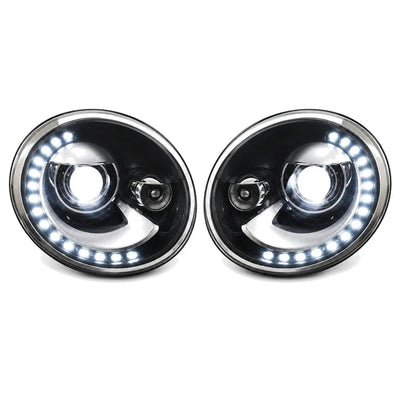 Les deux phares LED Beetle vus de face, couronnes de diodes allumées