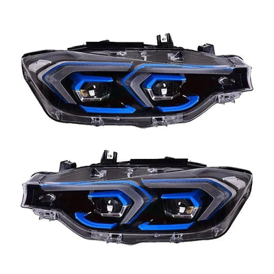 Deux phares LED BMW F30 vus de face, anneaux et chevrons bleus allumés